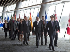 Prime Minister Justin Trudeau leads Canada's premiers to a news conference during the First Ministers Meeting in Vancouver, B.C., Thursday, March. 3, 2016.