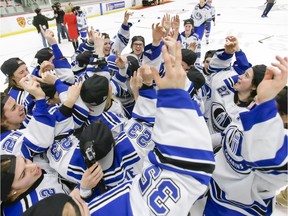 The Montreal Carabins celebrate winning the CIS Women's Hockey Championship at Winsport in Calgary, Alta., on Sunday, March 20, 2016. The Montreal Carabins beat the UBC Thunderbirds 8-0. Lyle Aspinall/Postmedia Network