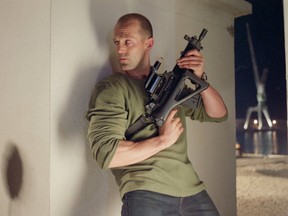 Jason Statham menacingly holds this gun and more in The Transporter. You can see it for free on Friday at The Plaza.