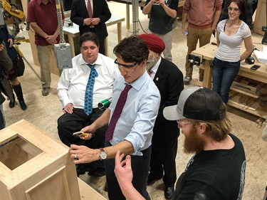 Justin Trudeau visits a fourth-year carpentry class SAIT Polytechnic in Calgary, Ab, on Tuesday, March 29, 2016.