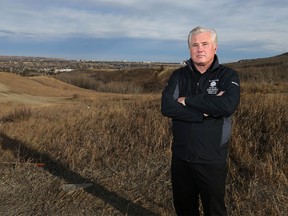 Calgary Coun. Ward Sutherland poses on the west edge of Calgary near the proposed Paskapoo Slopes development on Friday, March 4, 2016. Jim Wells//Postmedia