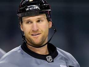 Dennis Wideman skates during a Calgary Flames team practice at the Scotiabank Saddledome in Calgary, Alta., on Wednesday, March 9, 2016. Wideman is patiently waiting for a verdict in his second appeal against a 20-game suspension for hitting a linesman.