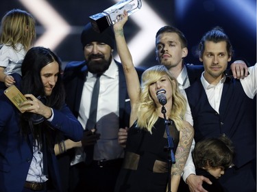 Walk Off the Earth accepts the award for Group of the Year during the Juno Awards at the Scotiabank Saddledome in Calgary, Alta., on Sunday, April 3, 2016. The Juno Awards celebrate the best in Canadian music.