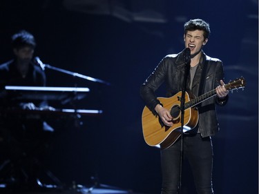 Shawn Mendes performs during the Juno Awards at the Sotiabank Saddledome in Calgary, Alta., on Scotiabank, April 3, 2016. The Juno Awards celebrate the best in Canadian music. Lyle Aspinall/Postmedia Network