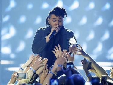 The Weeknd performs during the Juno Awards at the Scotiabank Saddledome in Calgary, Alta., on Sunday, April 3, 2016. The Juno Awards celebrate the best in Canadian music. Lyle Aspinall/Postmedia Network