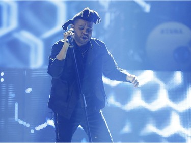 The Weeknd performs during the Juno Awards at the Scotiabank Saddledome in Calgary, Alta., on Sunday, April 3, 2016. The Juno Awards celebrate the best in Canadian music