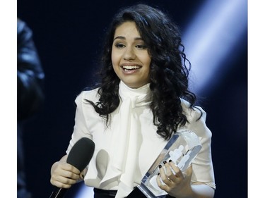 Alessia Cara accepts the award for Breakthrough Artist of the Year during the Juno Awards at the Scotiabank Saddledome in Calgary, Alta., on Sunday, April 3, 2016. The Juno Awards celebrate the best in Canadian music. Lyle Aspinall/Postmedia Network