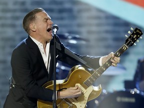 Bryan Adams performs during the Juno Awards at the Scotiabank Saddledome in Calgary, Alta., on Sunday, April 3, 2016. Adams will be joined by and all-Canadian all-star lineup of openers including Amanda Marshall and Odds.