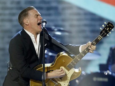 Bryan Adams performs during the Juno Awards at the Scotiabank Saddledome in Calgary, Alta., on Sunday, April 3, 2016. The Juno Awards celebrate the best in Canadian music. Lyle Aspinall/Postmedia Network