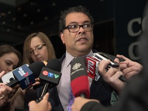 Mayor Naheed Nenshi speaks to the media after a city council meeting adjourned on Monday, April 25, 2016.