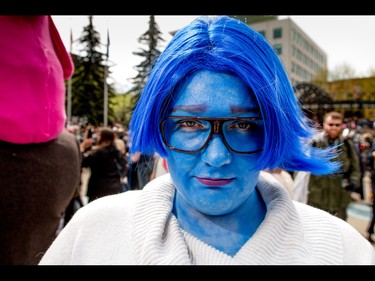 Kristen deJong puts on her happiest face as Sadness from Inside Out at the annual Parade of Wonders that kicks off the Calgary Comic & Entertainment Expo at the BMO Centre in Calgary, Ab., on Friday April 29, 2016. Mike Drew/Postmedia