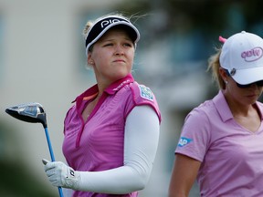 KAPOLEI, HI - APRIL 14:  Brooke Henderson of Canada walks past Paula Creamer after her tee shot on the ninth hole during the second round of the LPGA LOTTE Championship Presented By Hershey at Ko Olina Golf Club on April 14, 2016 in Kapolei, Hawaii.  (Photo by Christian Petersen/Getty Images)