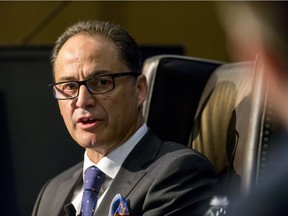 Alberta Finance Minister Joe Ceci speaks with Adam Legge, president of the Calgary Chamber of Commerce, during a Chamber breakfast at the Hyatt Regency on Monday.