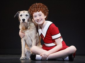 Annie  Heidi Gray as Annie and Macy as Sandy the dog. Credit: Joan Marcus.