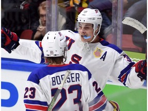 United States' Auston Matthews, back, celebrates a goal with teammate Brock Boeser during third period preliminary hockey action at the IIHF World Junior Championship in Helsinki, Finland, on Saturday, Dec. 26, 2015. Matthews will be on the Toronto Maple Leafs' mind for the next few weeks.The Leafs will have a 20 per cent chance of landing the No. 1 overall pick at the NHL draft lottery on April 30.