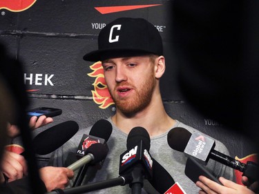 The Calgary Flames' Dougie Hamilton speaks with the media at the Scotiabank Saddledome as the team cleared out their lockers for the season on Monday, April 11, 2016.
