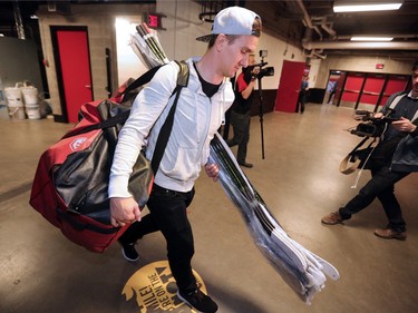 Calgary Flames centre Mikael Backlund heads out of the Scotibank Saddledome as the team cleared out their lockers for the season on Monday, April 11, 2016.