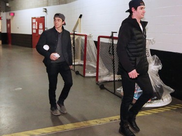 Calgary Flames Sean Monahan and Johnny Gaudreau walk out of the Scotiabank Saddledome as the team cleared out their lockers for the season on Monday, April 11, 2016.