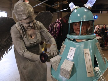 Dr Who fans Karin Weeks and her son Gavin, 6, makes some final adjustments before the kids costume showcase during the Calgary Comic and Entertainment Expo  on Saturday, April 30, 2016.