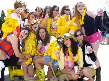 2006 - The "Yellow Rubber Crew" in the beer gardens at Bermuda Shorts Day.  All 17 women went to Mexico in February and have been dressing up for BSD since 2003.