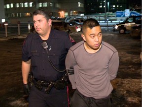 Franz Cabrera shown being taken into custody.