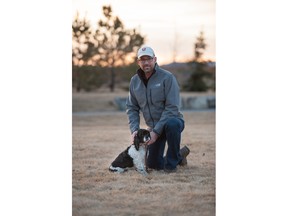 James Cooke and his dog Charlie in Heartland, Cochrane.