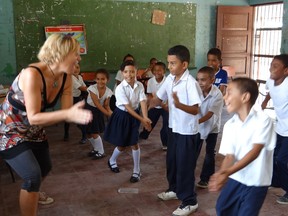 Calgary musician and teacher Nico Brennan with some of the students of a school in Nicaragua.