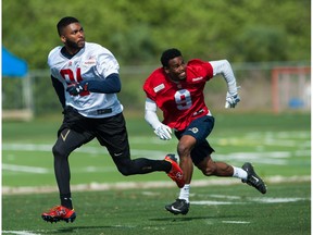 BRADENTON, FL - APRIL 17:  WR Darius Daniels, 81, and DB Travis Manning, 9, of the Calgary Stampeders practice during mini camp at IMG Academy in Bradenton, Fla., on April 17, 2015 in Bradenton, Florida.