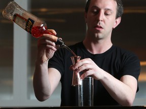 Bartender Dylan Cann makes a Henrietta Cocktail with Yellow Chartreuse, Cabrito Tequila and Aperol at Ten Toot Henry.