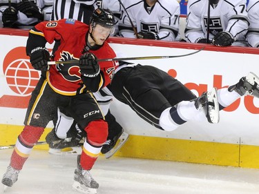 Hunter Shinkaruk, in his first game for the Calgary Flames at the Saddledome, levels Brayden McNabb of the Los Angeles Kings on his first shift Tuesday April 5, 2016.