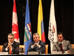 The three panelists discuss the peace process in Colombia between the government and the FARC guerilla group Tuesday April 25, 2016 at the Calgary Petroleum Club. From left are  Columbian Ambassador to Canada Nicolas Lloreda, Ricardo Avila, editor of newspaper Diario Portafolio and Colombian senator Juan Manuel Galan.