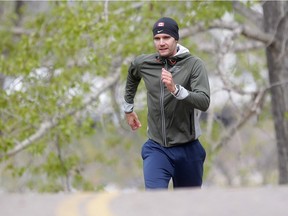 Mat Bilodeau trains for the upcoming Rio Olympics where he will be competing in race walking Wednesday April 27, 2016 on the Bow River pathway in Inglewood. (Ted Rhodes/Postmedia)
