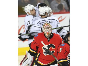 Calgary Flames goalie Joni Ortio closes his eyes after being scored on by the Los Angeles Kings in the second period at the Saddledome Tuesday April 5, 2016.