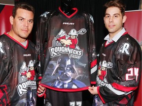 The Calgary Roughnecks Jeff Shattler and Scott Carnegie unveil a limited edition jersey at the Scotiabank Saddledome in Calgary, Alta., on Wednesday, April 6, 2016 The unique jersey will make its one and only appearance on Saturday, April 9, when the Roughnecks (6-9) host the Vancouver Stealth (3-10) for Stars Wars Night, benefiting STARS. AL CHAREST/POSTMEDIA