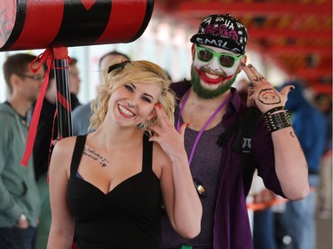 Rebecca Skavberg as Punk Rock Harley Quinn and Brandon Cameron,  Punk Rock Joker, super villians from Batman, wait in the line as the doors open on this year's Calgary Comic and Entertainment Expo at the BMO Centre Thursday, April 28, 2016.