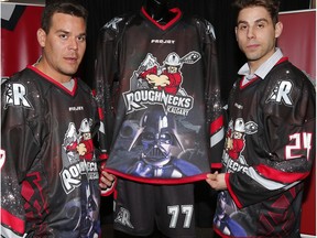 The Calgary Roughnecks Jeff Shattler and Scott Carnegie unveil a limited edition jersey at the Scotiabank Saddledome in Calgary, Alta., on Wednesday, April 6, 2016 The unique jersey will make its one and only appearance on Saturday, April 9, when the Roughnecks (6-9) host the Vancouver Stealth (3-10) for Stars Wars Night, benefiting STARS. AL CHAREST/POSTMEDIA