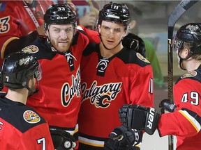 Mikael Backlund of the Calgary Flames celebrates the first of his goals against the Vancouver Canucks in the first period at the Saddledome Thursday night April 7, 2016. With him are, from left, TJ Brodie, Jakub Nakladal and Hunter Shinkaruk.