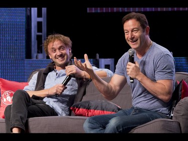 Jason Isaacs (R) and Tom Felton, the Malfoys from the Harry Potter films, speak during their panel during the Calgary Comic and Entertainment Expo at Stampede Park in Calgary, Alta., on Sunday, May 1, 2016. Lyle Aspinall/Postmedia Network