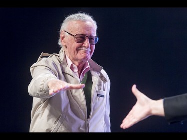 Comic book icon Stan Lee walks on stage for his panel discussion during the Calgary Comic and Entertainment Expo at Stampede Park in Calgary, Alta., on Sunday, May 1, 2016. Lyle Aspinall/Postmedia Network