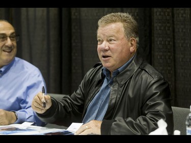 Actor William Shatner signs autographs during the Calgary Comic and Entertainment Expo at Stampede Park in Calgary, Alta., on Saturday, April 30, 2016. Lyle Aspinall/Postmedia Network