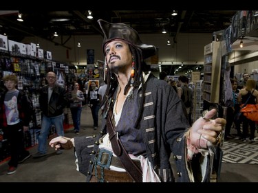 Captain Jack Sparrow, portrayed by Jed Lang, walks the Calgary Comic and Entertainment Expo at Stampede Park in Calgary, Alta., on Saturday, April 30, 2016. Lyle Aspinall/Postmedia Network