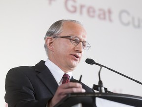 CEO Garth Atkinson speaks during the Calgary Airport Authority's Annual General Meeting at the Calgary Aero Space Museum in Calgary, Alta., on Thursday, April 21, 2016. The authority lauded its expansion to Calgary International Airport while trying to quell public concerns regarding noise levels.