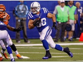 INDIANAPOLIS, IN - SEPTEMBER 3: Tyler Varga #38 of the Indianapolis Colts runs the ball against the Cincinnati Bengals at Lucas Oil Stadium on September 3, 2015 in Indianapolis, Indiana.  Michael Hickey/Getty Images/AFP