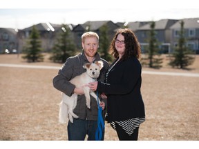 Conor and Tia Staples with their dog Blanket in Southwinds in Airdrie.