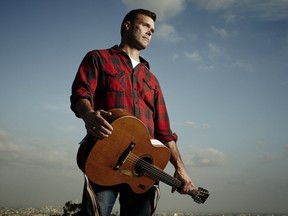 Corb Lund performs with The Hurtin' ALbertans at the NAC. credit Scott Council handout for endemann