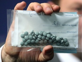 Fentanyl seized by the Calgary Police Service drug unit is displayed in this 2015 file photo.