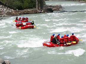 Rafters take on the whitewater rapids on the Kicking Horse River in B.C.