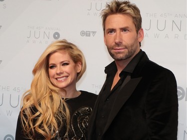 Avril Lavigne and Chad Kroeger on the red carpet at the 2016 Juno Awards at the Saddledome in Calgary, Alta., on Sunday, April 3, 2016.  GAVIN YOUNG/POSTMEDIA