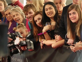 Fans wait on the red carpet at the 2016 Juno Awards at the Saddledome in Calgary, Alta., on Sunday, April 3, 2016.