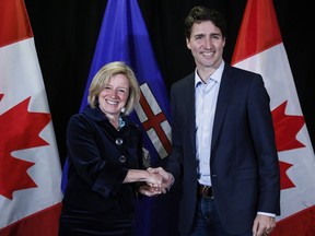 Prime Minister Justin Trudeau meets with Alberta Premier Rachel Notley following meetings at a Liberal Party cabinet retreat in Kananaskis on Sunday.